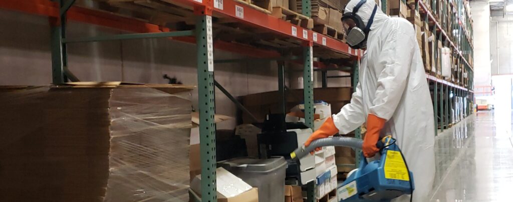 Technician fogs manufacturing plant in Chicagoland area after a COVID 19 outbreak - ServiceMaster Restoration By Simons