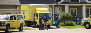 ServiceMaster Restoration By Simons truck outside single family home